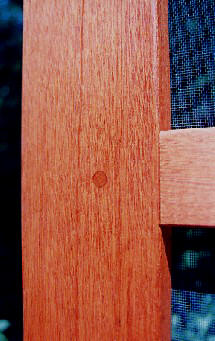 Honduras mahogany with a clear, wood protector finish